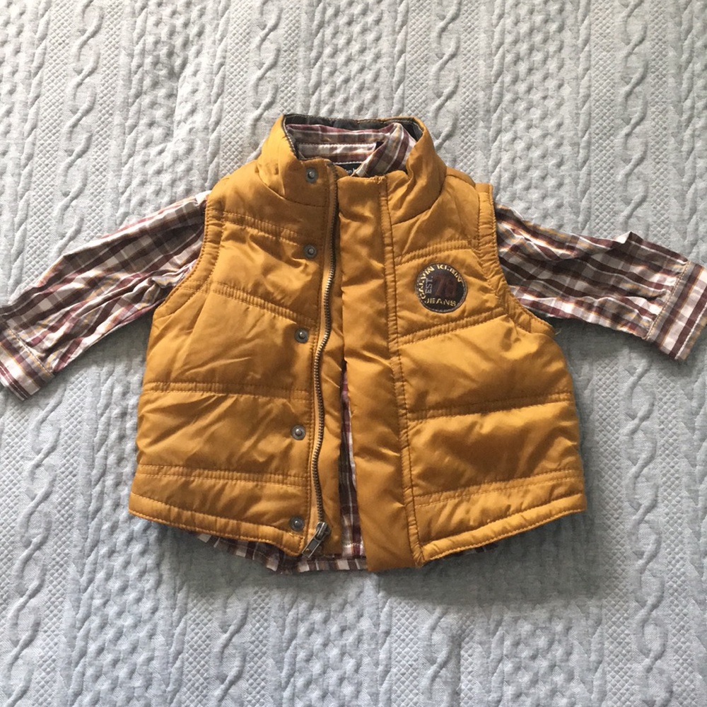 Calvin Klein button up and vest.